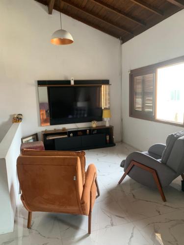 Tramandai House | Casa com 4 quartos e piscina pra aproveitar