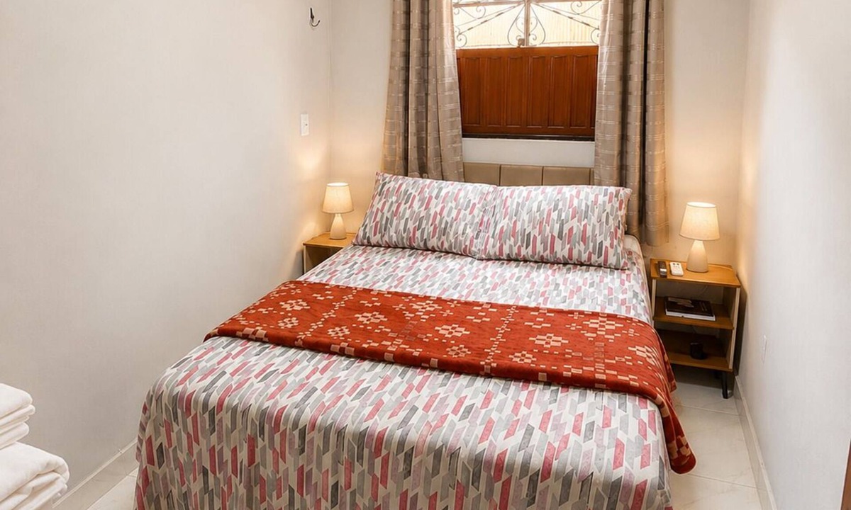 Cremacao House | Casa Laranja com Split e Wi-Fi 700 MB