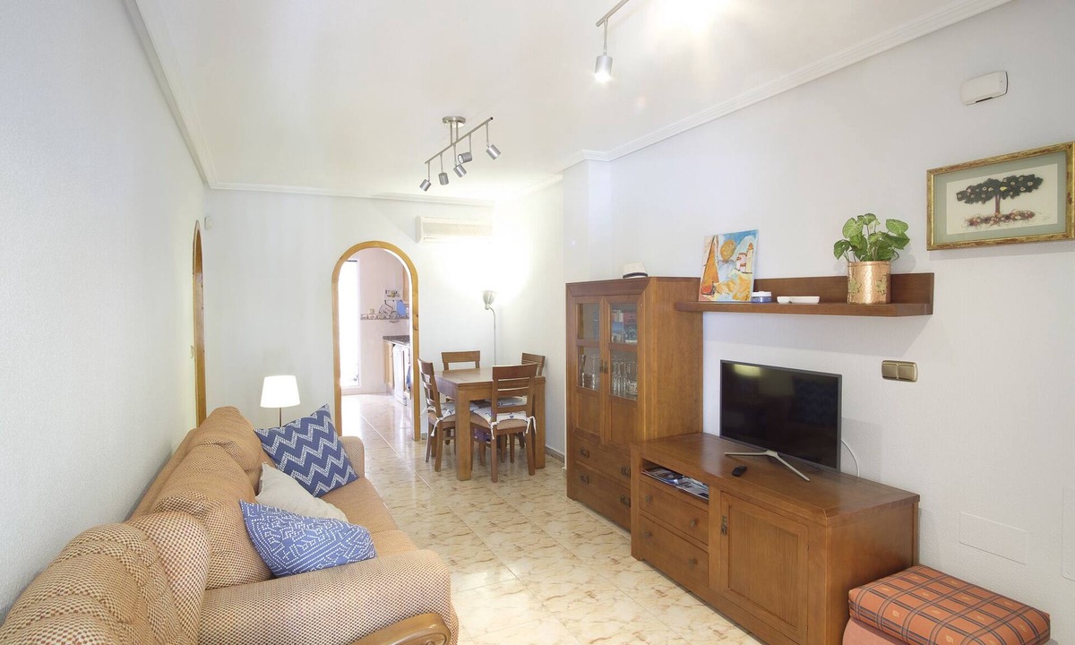 La Marina Apartment | Cozy family apartment with patio and terrace and communal swimming pool