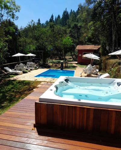 Sao Sebastiao das Aguas Claras Hotel | Pousada Canto Da Lua - Macacos