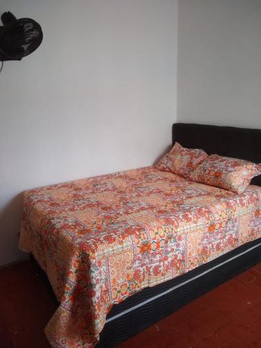 Mongagua House | Quarto e Cozinha em Mongaguá