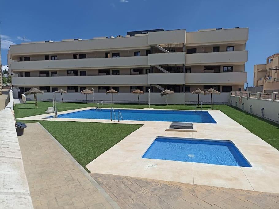 Benajarafe Apartment | Victoria 2. Piscina comunitaria