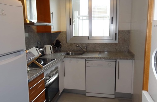 Denia Apartment | Modern apartment on the beach with large communal pool, fitness, air conditioning