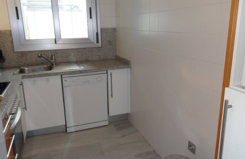 Denia Apartment | Modern apartment on the beach with large communal pool, fitness, air conditioning
