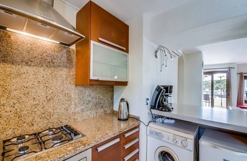 Cala d'Or Apartment | Refurbished 2 Bedroom Apartment with A/C, Communal Pool, Private Terrace at the Marina in Cala d'Or!