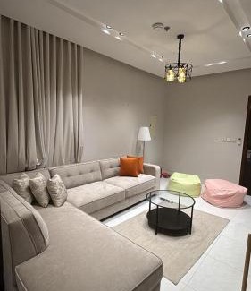 Dammam Apartment | Room and living room facing the sea