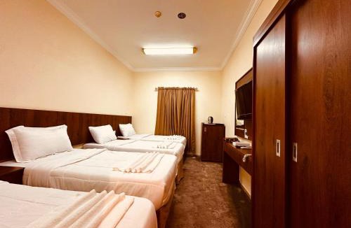 Mecca Hotel | جوهرة ذاخر البراقة توصيل مجاني إلى الحرم Jawharat Dhakher Al-Baraqa Free