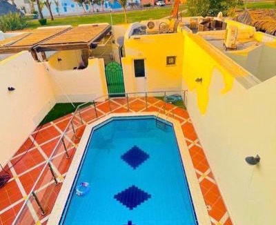 Durrat Al-Arous Villa | درة العروس فيلا البيلسان الشاطي الازرق