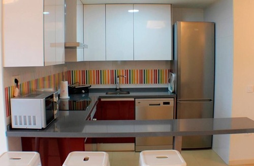 Torre de la Horadada Apartment | 2 bedroom apartment on the 1st line of the sea and community pools.