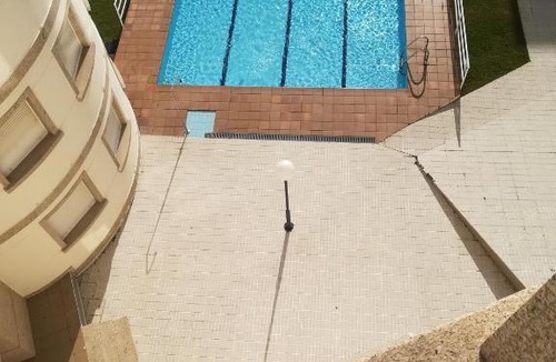 Sanxenxo Apartment | Apartamento en edificio nuevo, con piscina, vistas a la ría y al puerto, ESTANCIA MÍNIMA 14 noches, perfil familiar, no se admiten grupos de jovenes