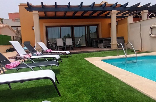 Caleta de Fuste Villa | Beautiful, spacious villa, heated pool, sleeps eight, with quality furnishings