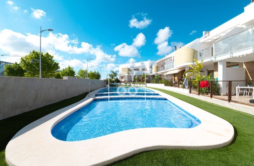 Pilar de la Horadada Apartment | Boho Breeze Penthouse - Rooftop bliss near beach and golf - By Oyoostays