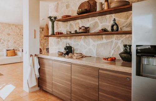 Cala Vadella Villa | Casa Stellar - boutique villa with private heated pool and sea view - sustainably solar powered