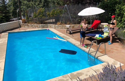 Miraflores de la Sierra Villa | Charming villa with a beautiful garden and spacious pool