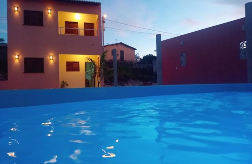 Aracati House | Duplex de 2 quartos com ar condicionado , piscina e estacionamento