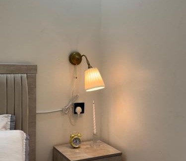 Ghirnatah Apartment | Luxury hotel suite with one bedroom and a living room