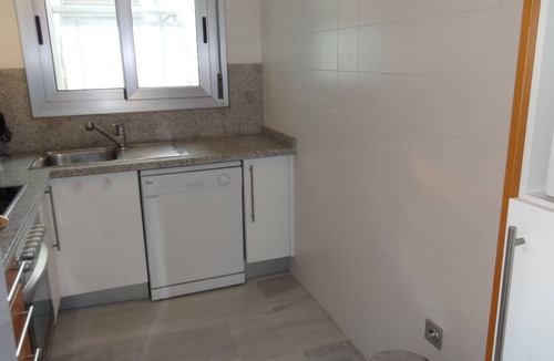 Denia Apartment | Modern apartment on the beach with large communal pool, fitness, air conditioning