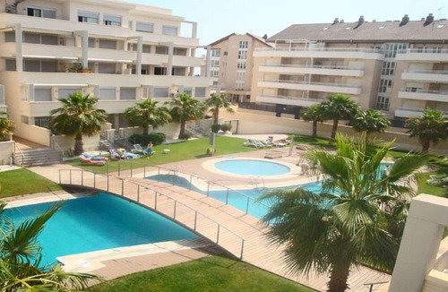 Denia Apartment | Modern apartment on the beach with large communal pool, fitness, air conditioning