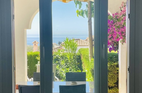 Mijas Apartment | Modern garden apartment with a fantastic view of the sea and a private garden