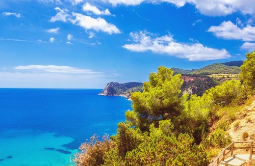 Cala Vadella Apartment | Oceanfront Retreat in Sant Josep de sa Talaia with Shared Pool