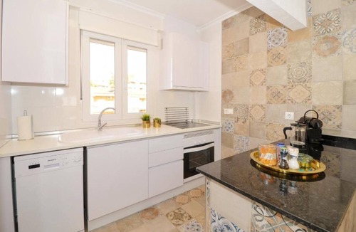 Punta Prima Apartment | Sit back and relax in a stylish space just a few steps from the beach! n