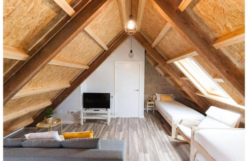 Redondela Apartment | Stone duplex apartment near the sea.