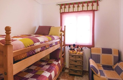 La Marina House | This beautiful vacation townhouse in La Marina, on the Costa Blanca, offers access to a communal poo