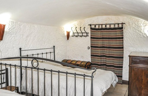 Baza House | This charming cave house, restored in a traditional style while offering the comforts of a modern ho