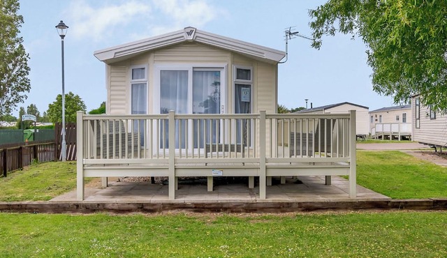 12ft-wide luxury caravan with one double and two twin.