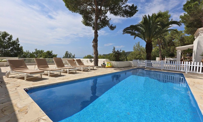 Sant Josep de sa Talaia Villa | My Rental Homes - Villa Zenith with private pool and nice garden with trees.