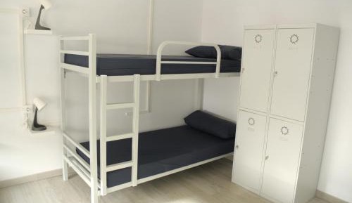 Single Bed in Dormitory Room